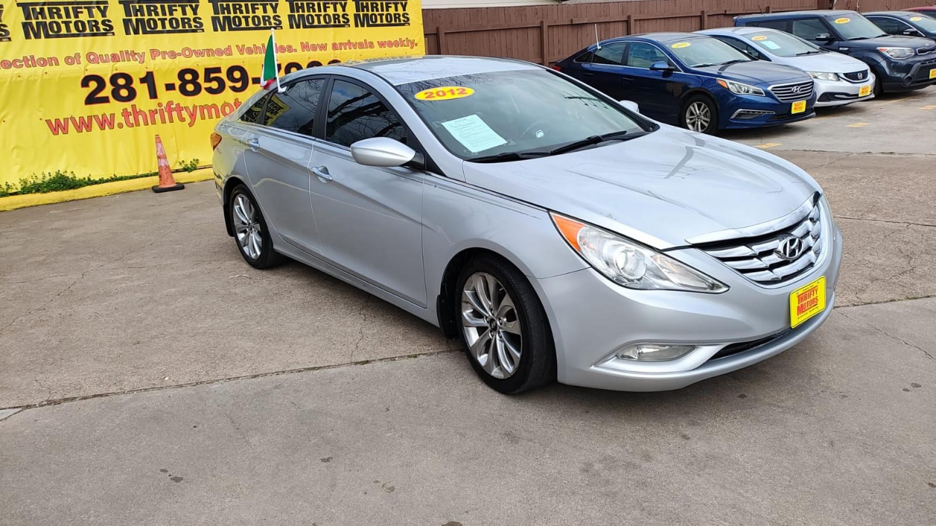 2012 Hyundai Sonata Limited Auto (5NPEC4AC9CH) with an 2.4L L4 DOHC 16V engine, 6-Speed Automatic transmission, located at 16710 Clay Rd., Houston, TX, 77084, (281) 859-7900, 29.834864, -95.656166 - Photo#2